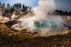 Geysers spew boiling water and steam into the air. Art Print